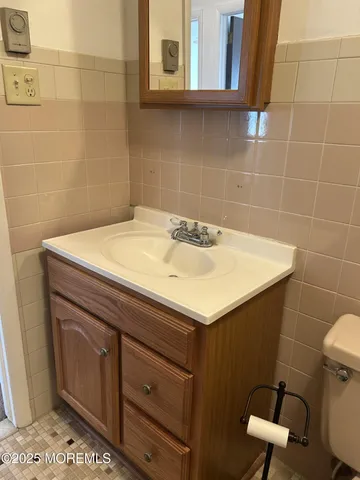 a bathroom with a sink and a toilet
