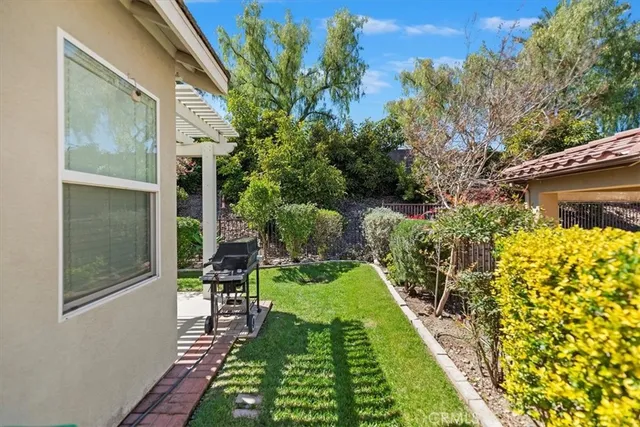 a view of yard from a corridor