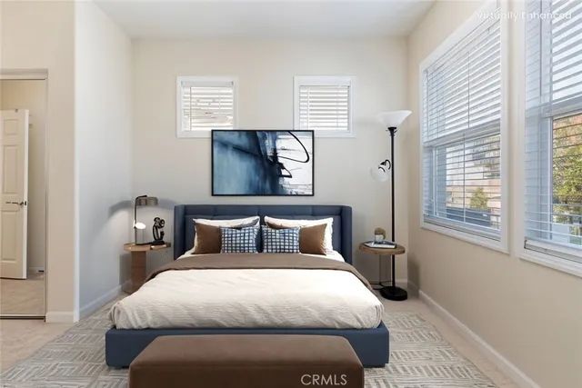 a bedroom with a bed and window