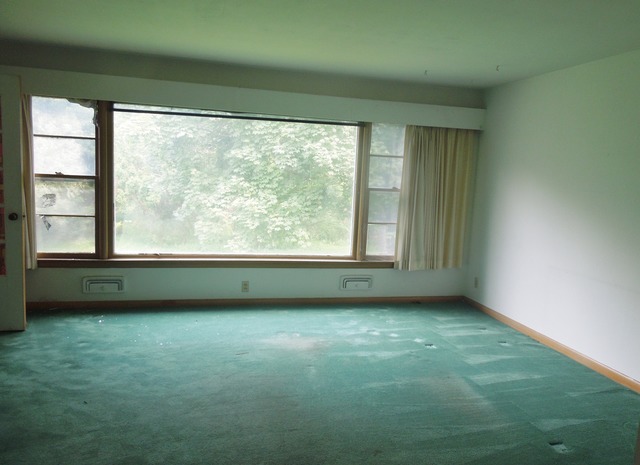 436 Russell Road DeKalb, IL 60115 - Photo 6 of 19 a view of an empty room with a window