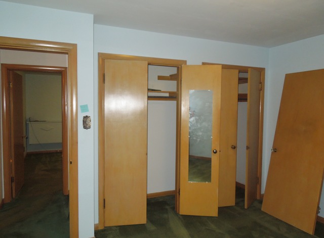 436 Russell Road DeKalb, IL 60115 - Photo 10 of 19 a view of a bathroom with a glass door