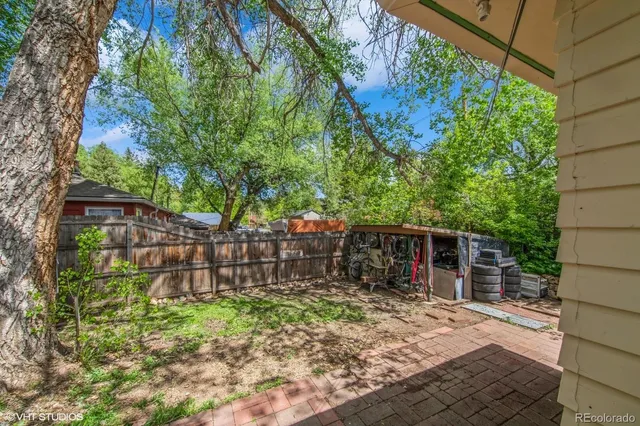 a house view with a backyard space
