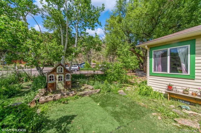 a view of house with outdoor space