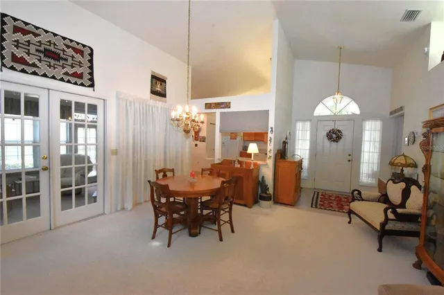 a kitchen with a sink appliances and cabinets