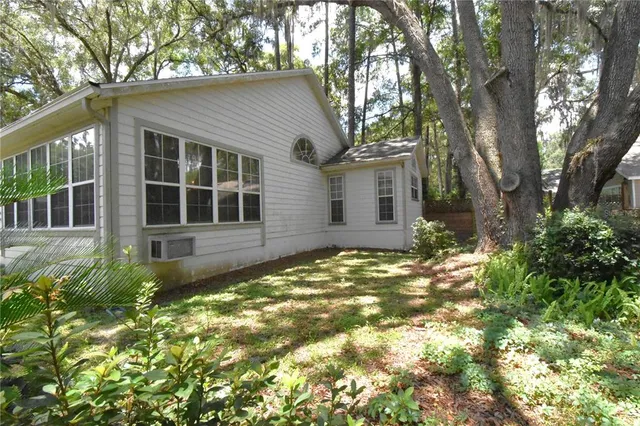 front view of a house with a trees