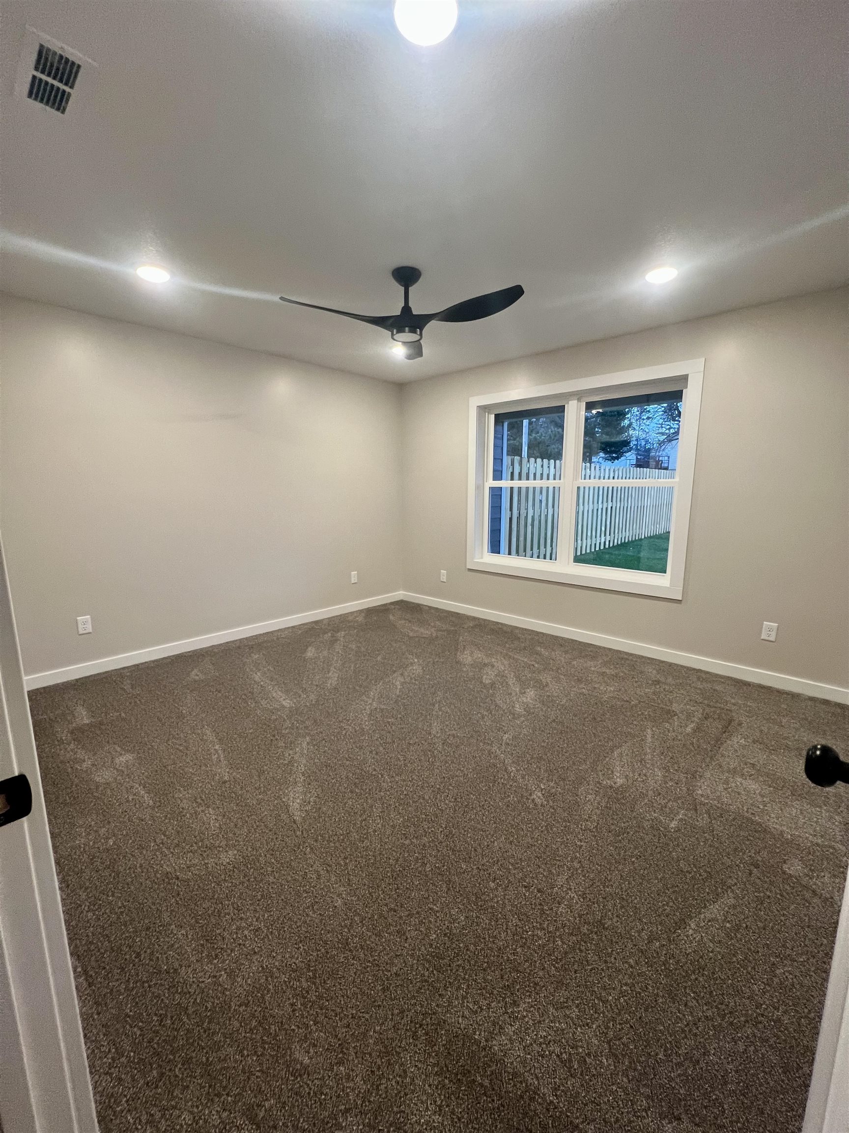 1006 26th Street, Unit B Cloquet, MN 55720 - Photo 21 of 27 Spare room with carpet, recessed lighting, and a ceiling fan