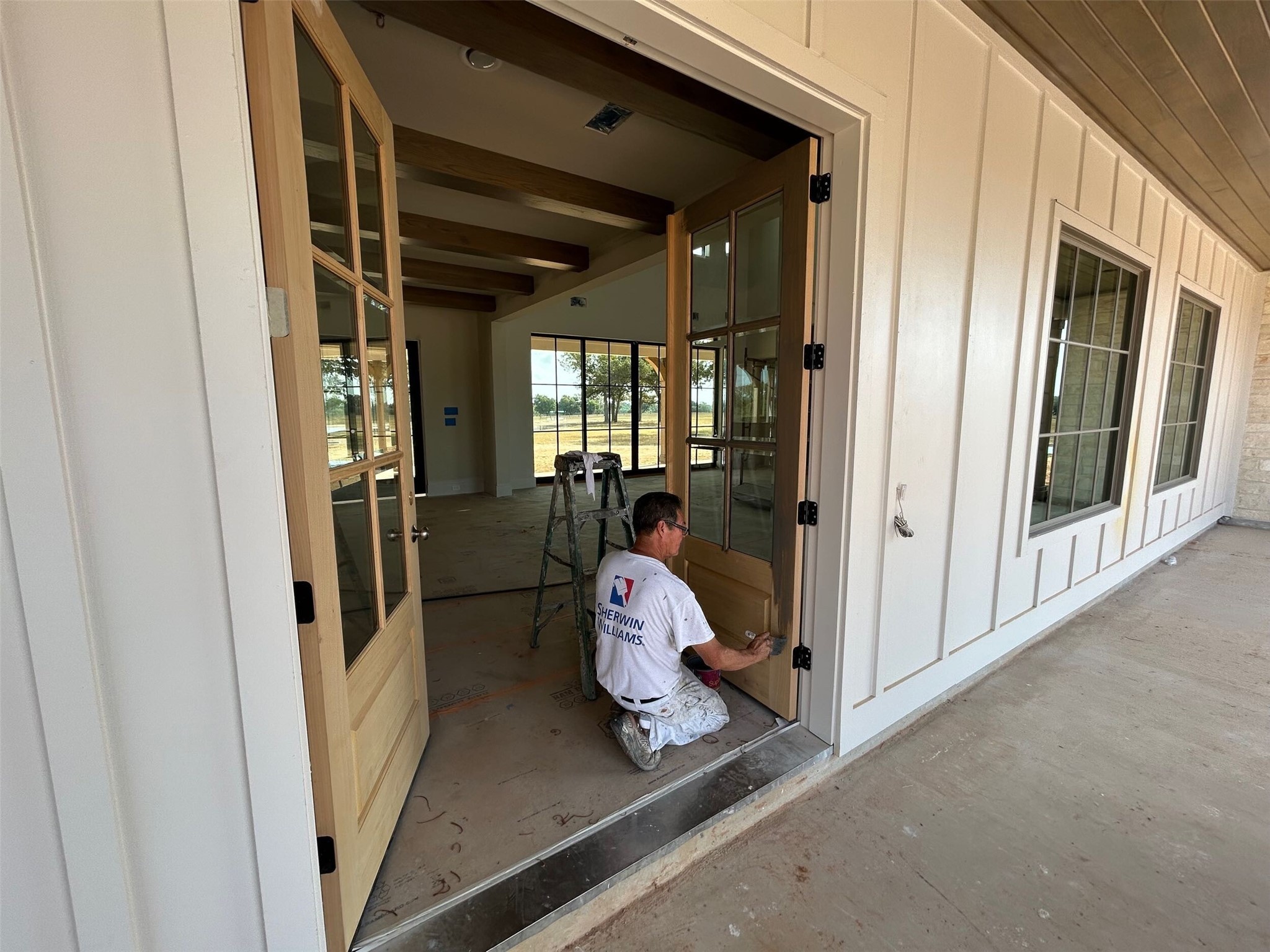 5655 Brazos Bow Way Washington, TX 77880 - Photo 15 of 38 a hallway with sliding door and furniture