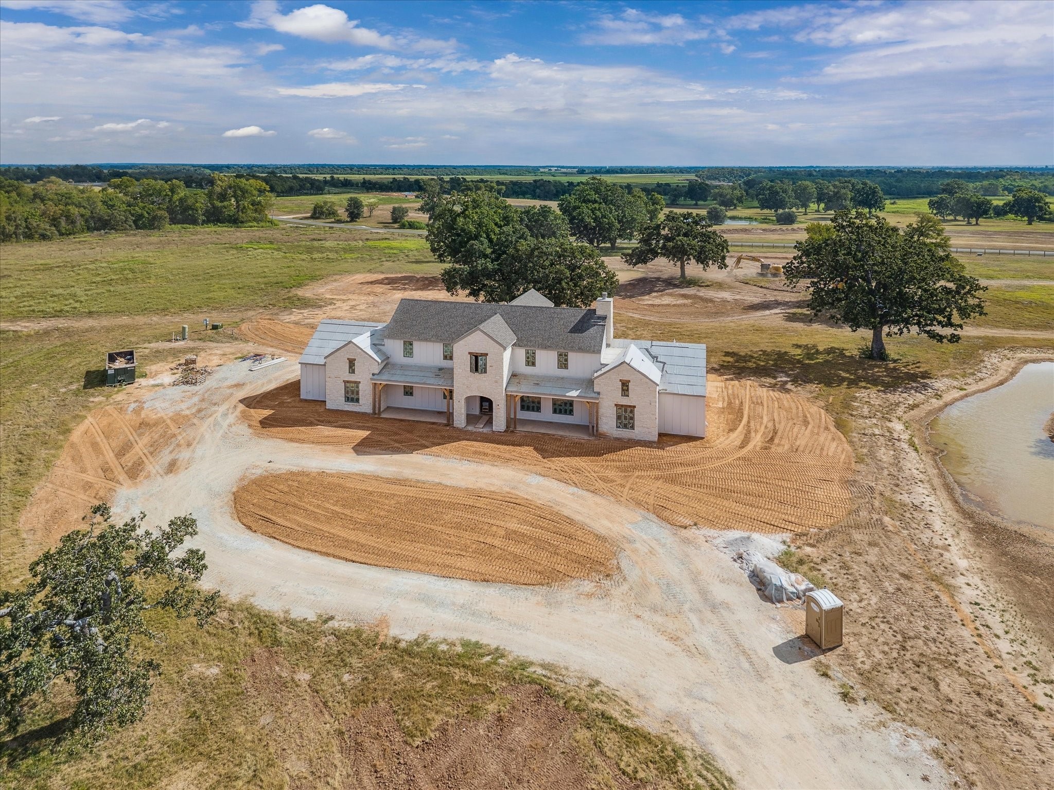 5655 Brazos Bow Way Washington, TX 77880 - Photo 18 of 38 a view of a lake with a city