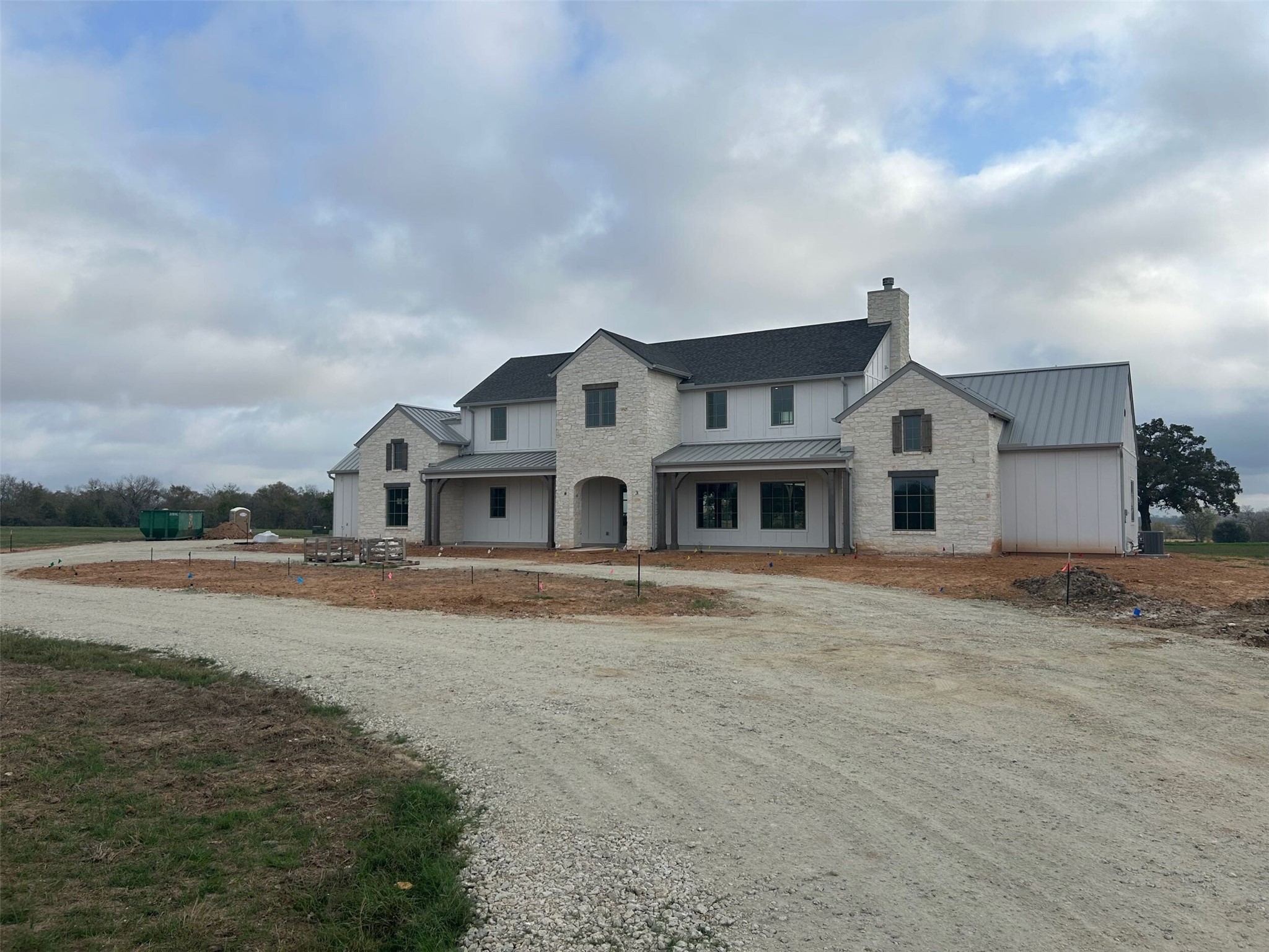 5655 Brazos Bow Way Washington, TX 77880 - Photo 2 of 38 a front view of a house with a yard