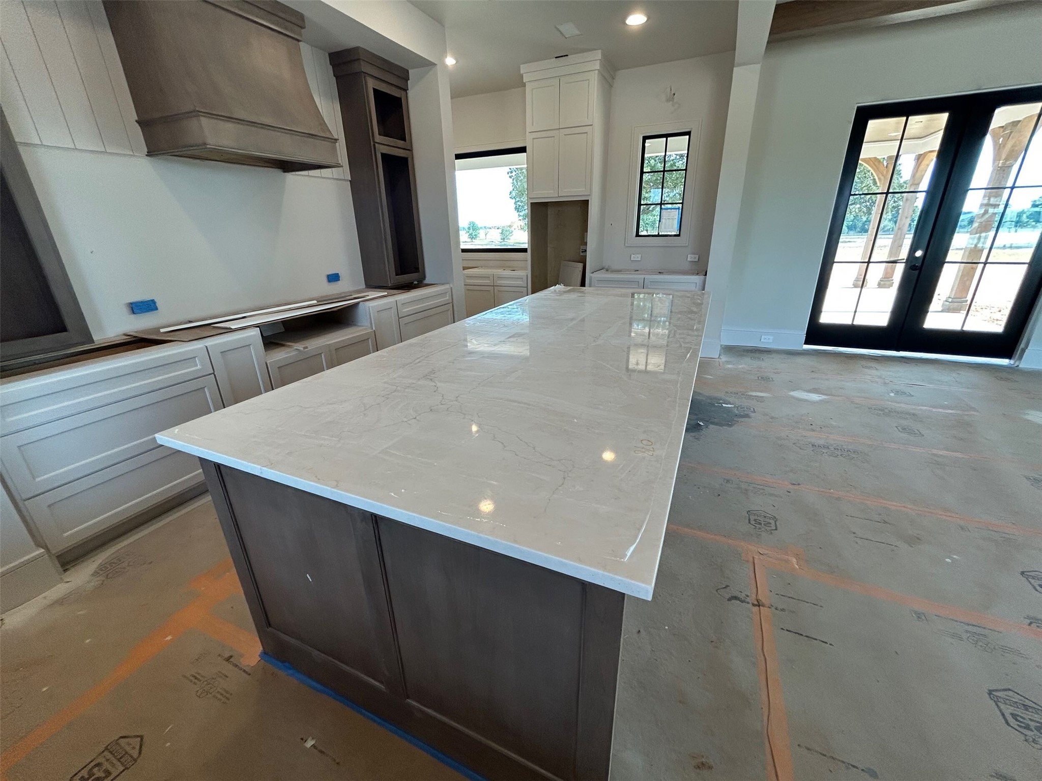 5655 Brazos Bow Way Washington, TX 77880 - Photo 9 of 38 a view of an empty room with window and wooden floor