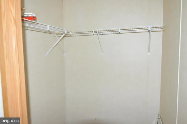 a view of an empty walk in closet