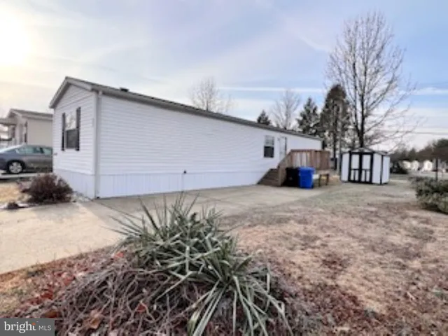 a house view with a backyard space
