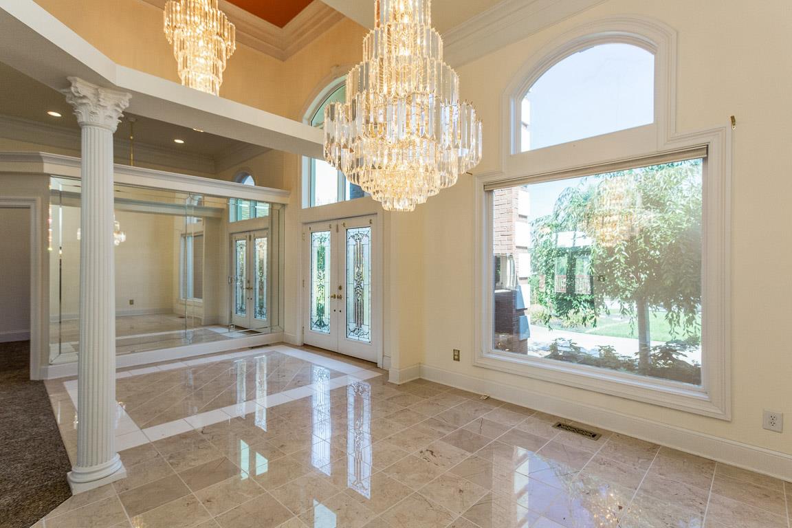 413 Ridgecrest Lane Lebanon, TN 37087 - Photo 4 of 30 BEAUTIFUL DINING ROOM WITH MARBLE FLOORS AND CHANDELIER
