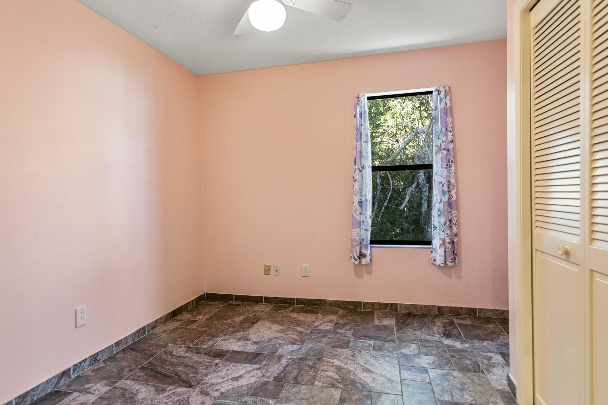 29 Hybiscus Avenue St. Augustine, FL 32084 - Photo 18 of 42 a view of an empty room with a window
