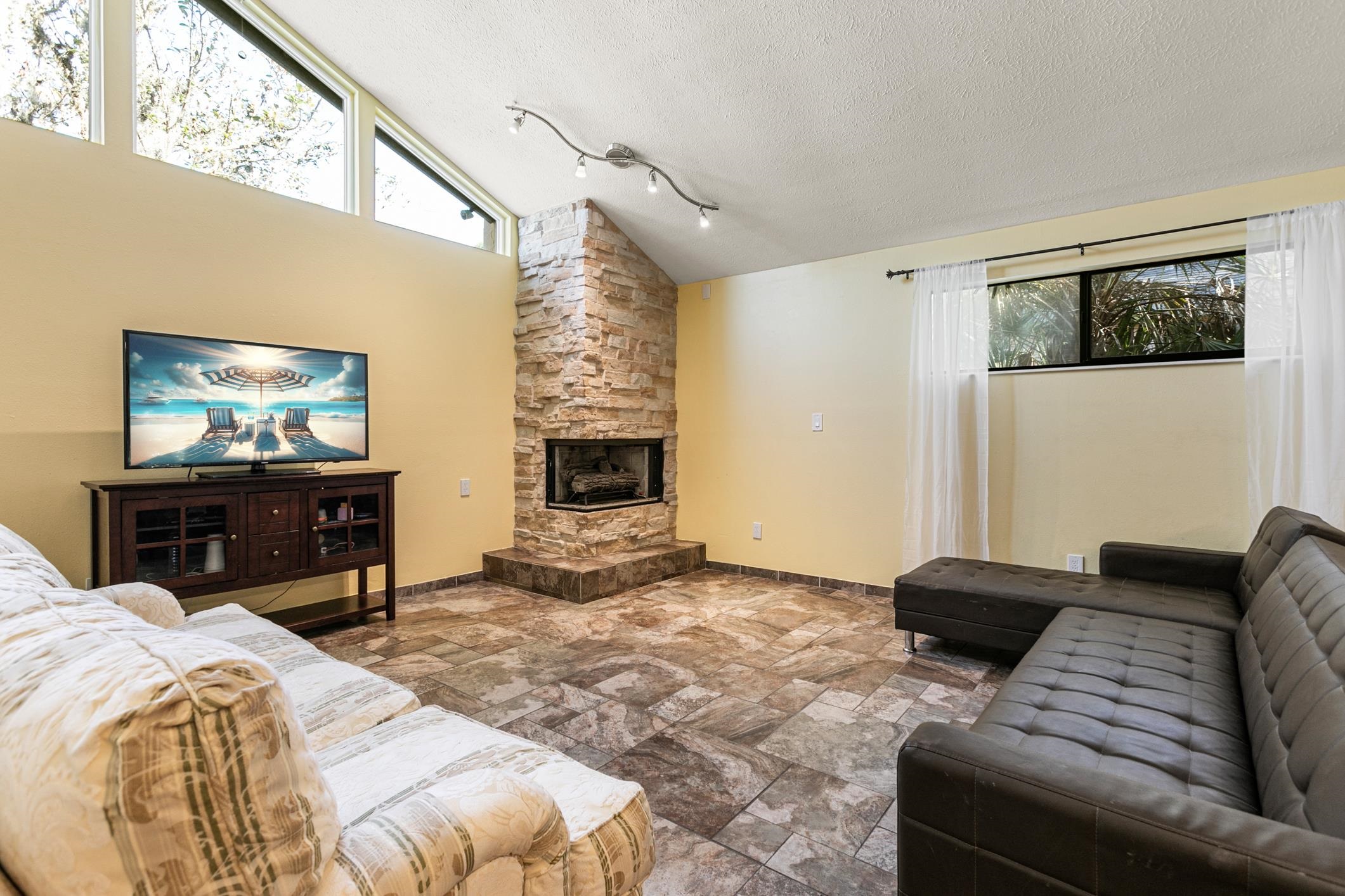 29 Hybiscus Avenue St. Augustine, FL 32084 - Photo 6 of 42 a bedroom with furniture and a flat screen tv