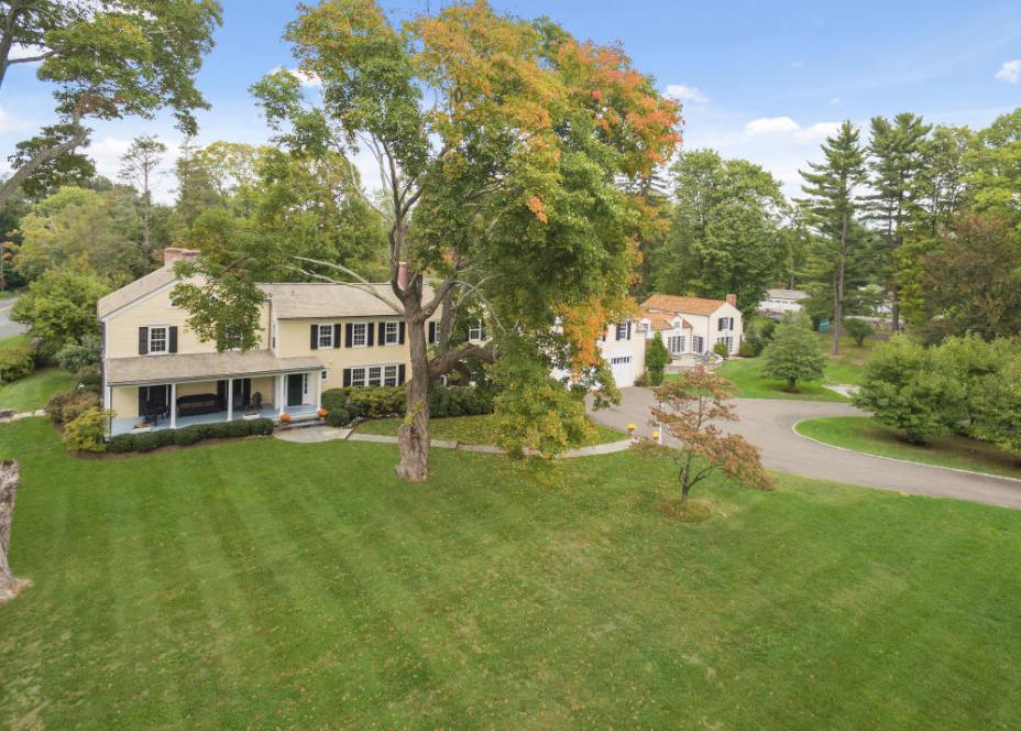991 Ponus Ridge Road New Canaan, CT 06840 - Photo 11 of 12 a view of a house with a big yard