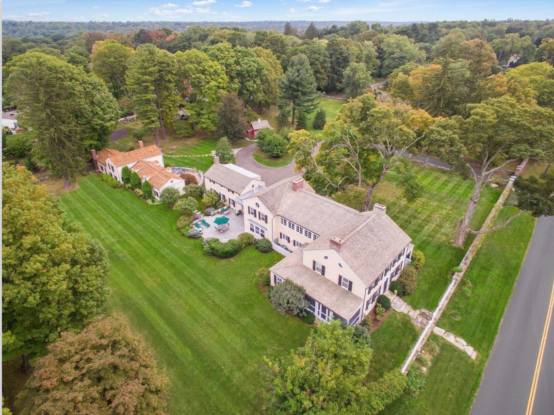 991 Ponus Ridge Road New Canaan, CT 06840 - Photo 12 of 12 an aerial view of a house with a garden