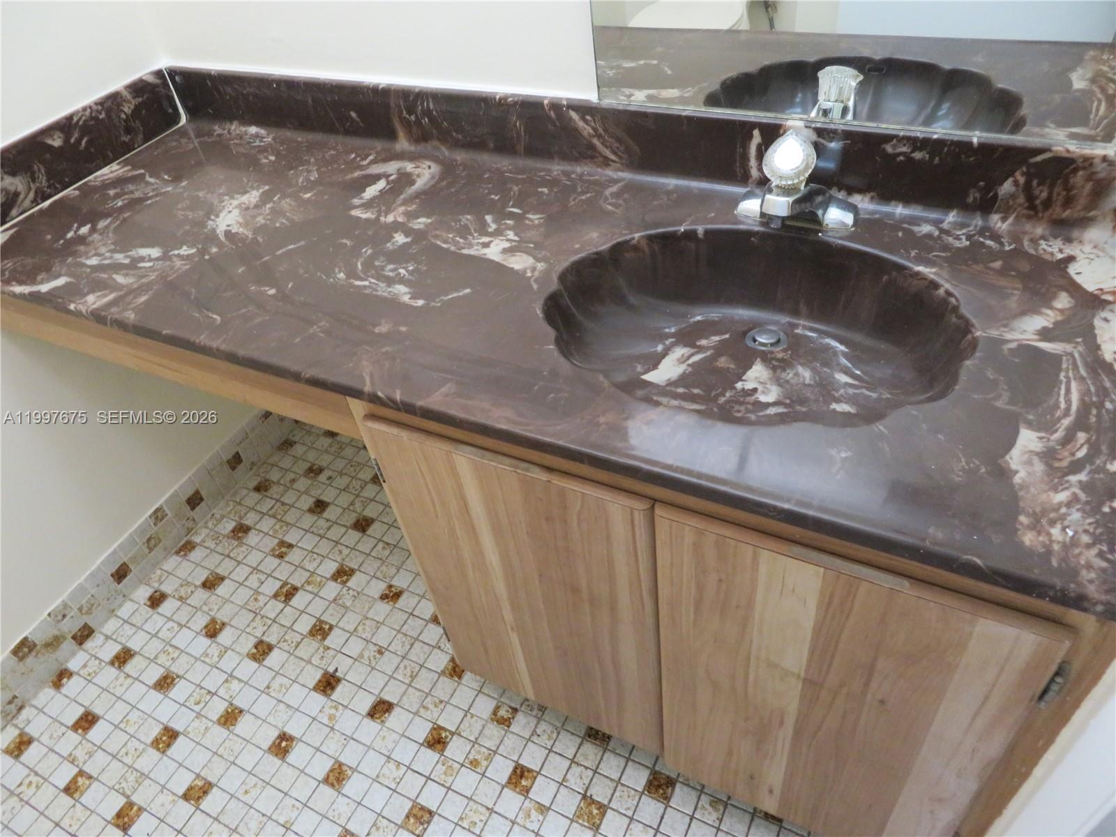 8005 Southwest 107th Avenue, Unit 309 Miami, FL 33173 - Photo 10 of 18 a kitchen with a stove