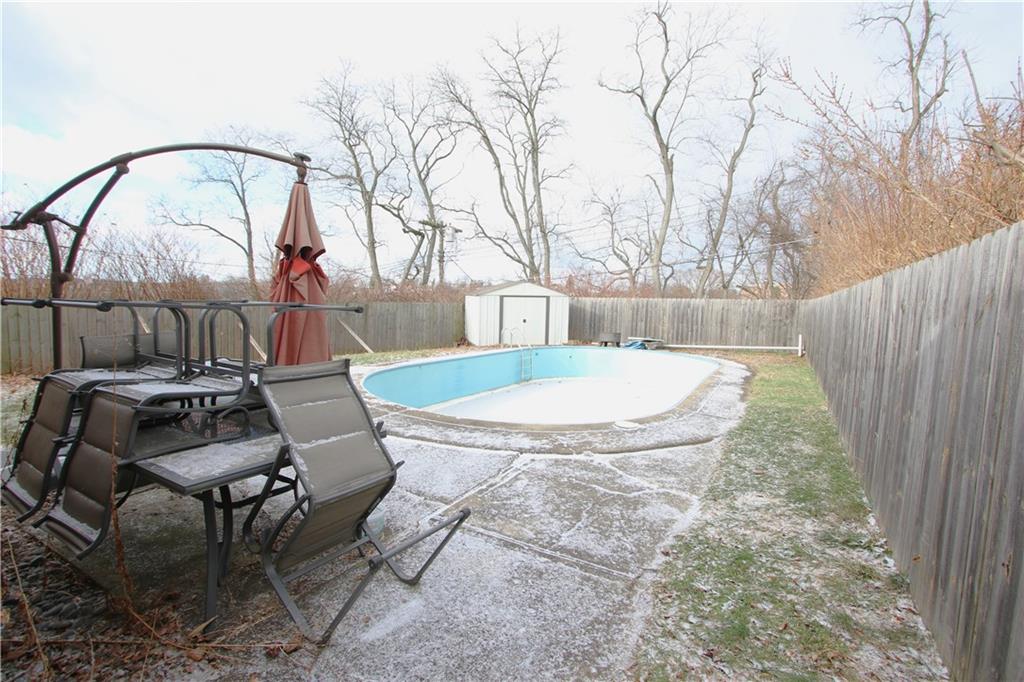 210 Livingston Road West Mifflin, PA 15122 - Photo 19 of 25 a view of a chairs and table in backyard