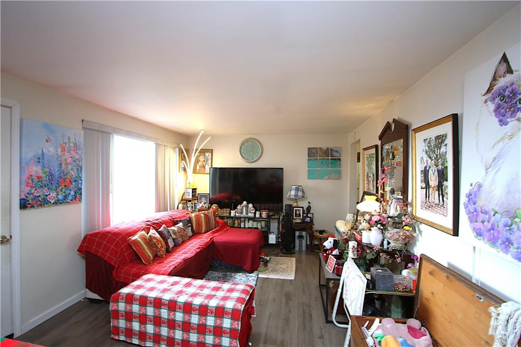 210 Livingston Road West Mifflin, PA 15122 - Photo 2 of 25 a living room with furniture fireplace and a window