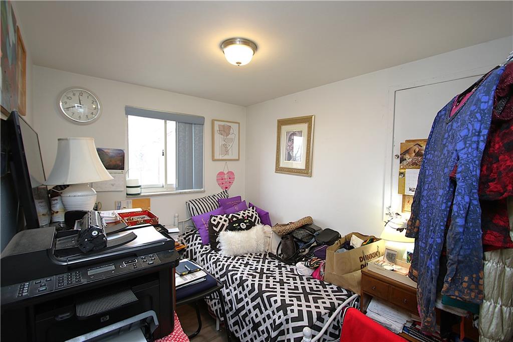 210 Livingston Road West Mifflin, PA 15122 - Photo 9 of 25 a bedroom with furniture and a window