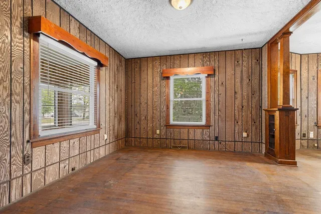 an empty room with windows