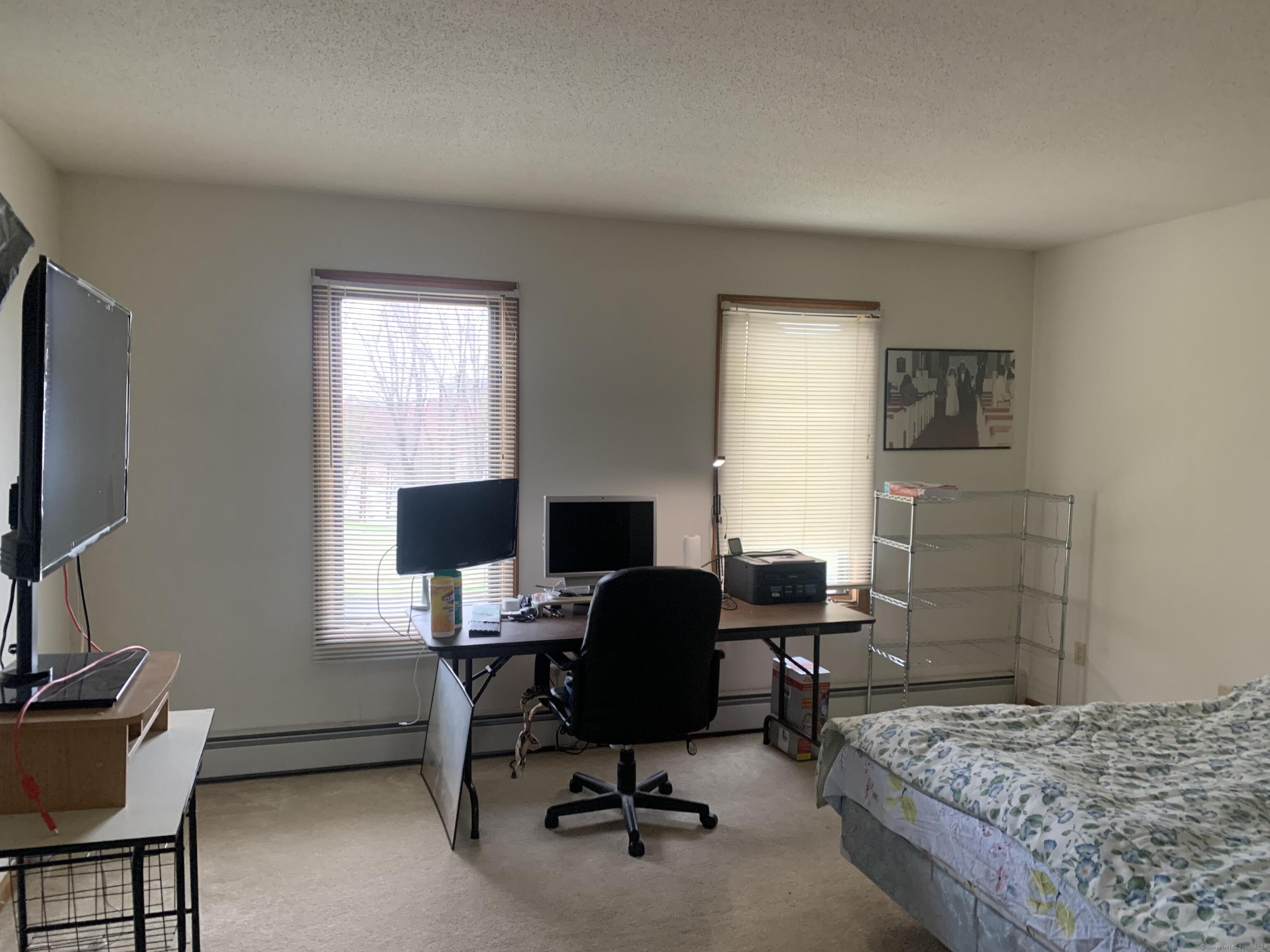 58 Amanda Circle Windsor, CT 06095 - Photo 21 of 36 a bedroom with a workspace