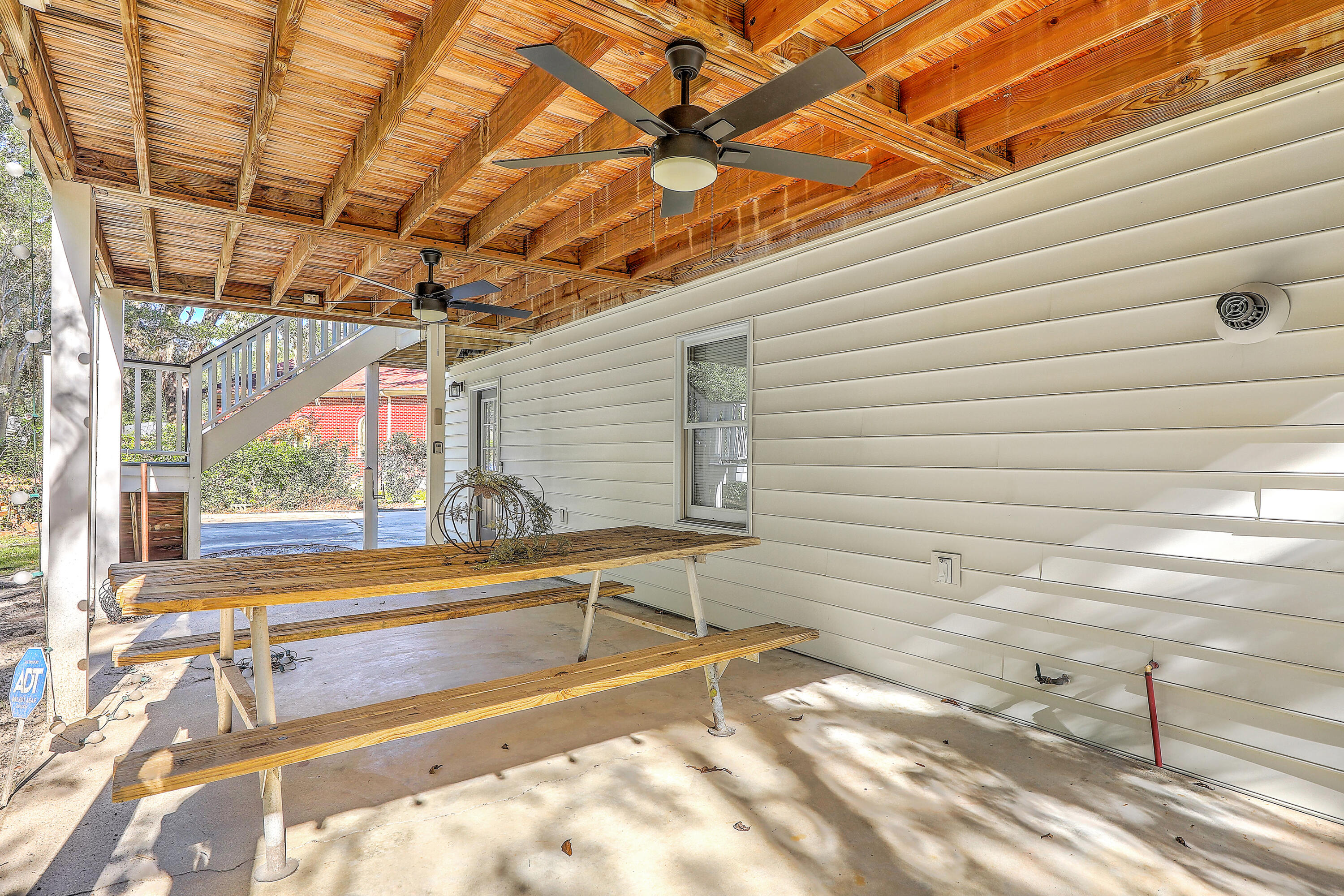 317 Rutherford Street Summerville, SC 29483 - Photo 45 of 50 Downstairs Patioi