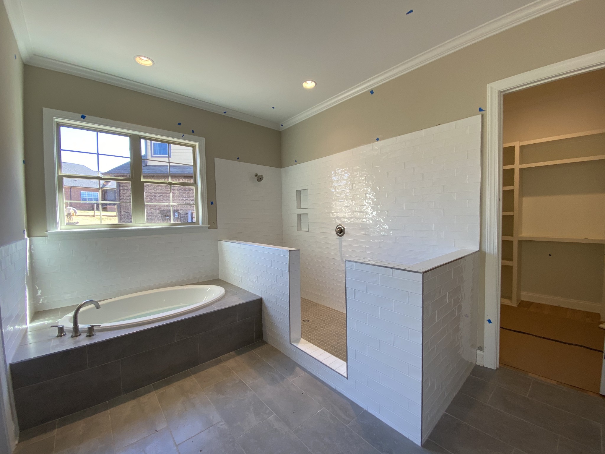 2019 Eagle View Road Hendersonville, TN 37075 - Photo 11 of 19 a spacious bathroom with a bathtub sink and mirror