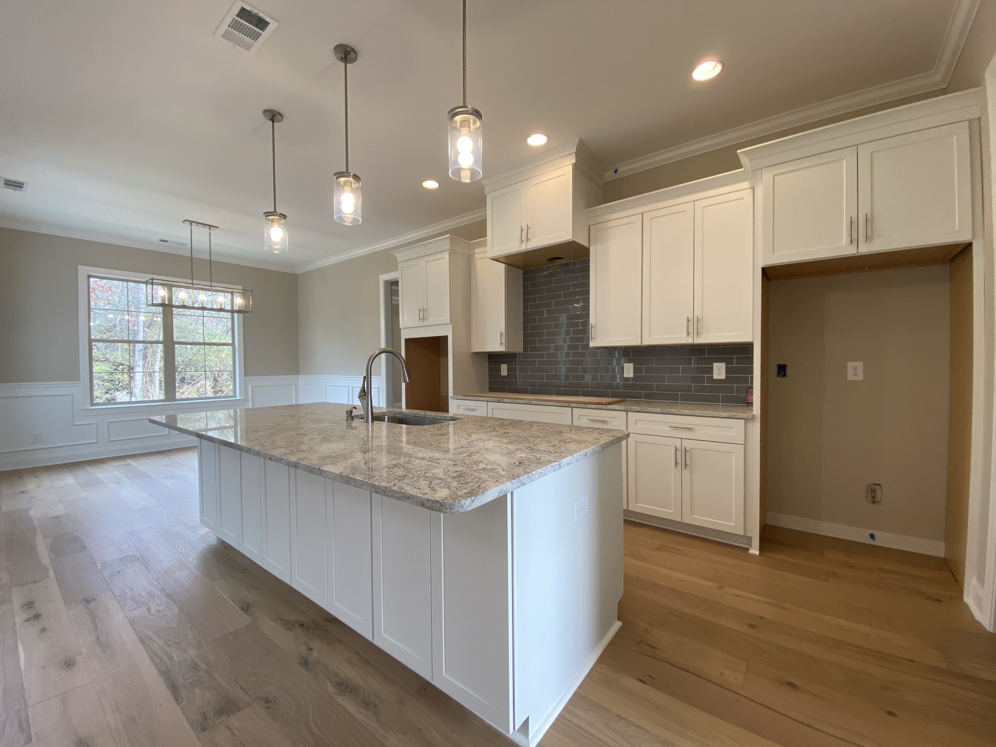 2019 Eagle View Road Hendersonville, TN 37075 - Photo 3 of 19 a kitchen with stainless steel appliances granite countertop a sink a stove and a refrigerator