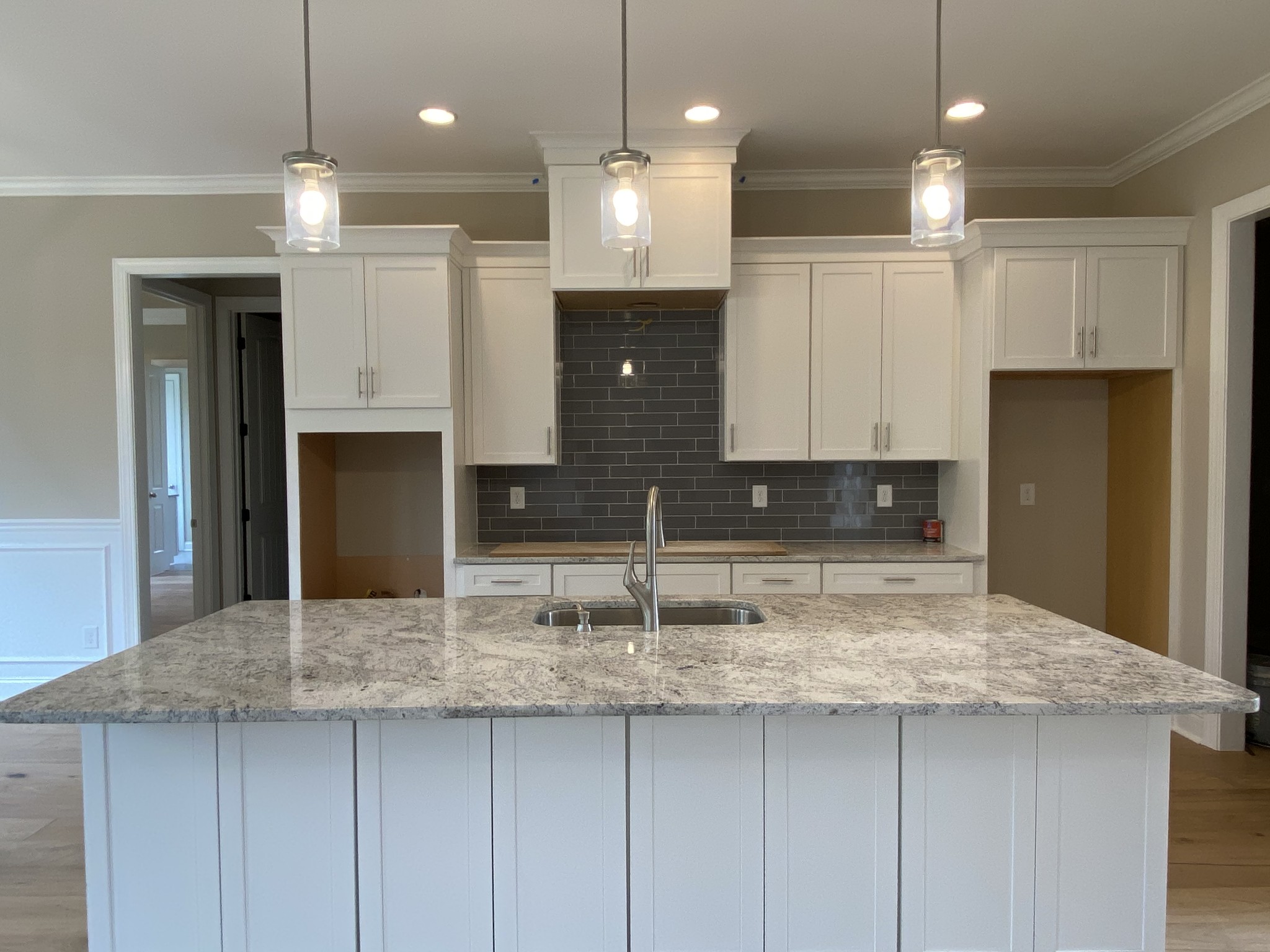 2019 Eagle View Road Hendersonville, TN 37075 - Photo 4 of 19 a kitchen with kitchen island granite countertop a sink cabinets and refrigerator