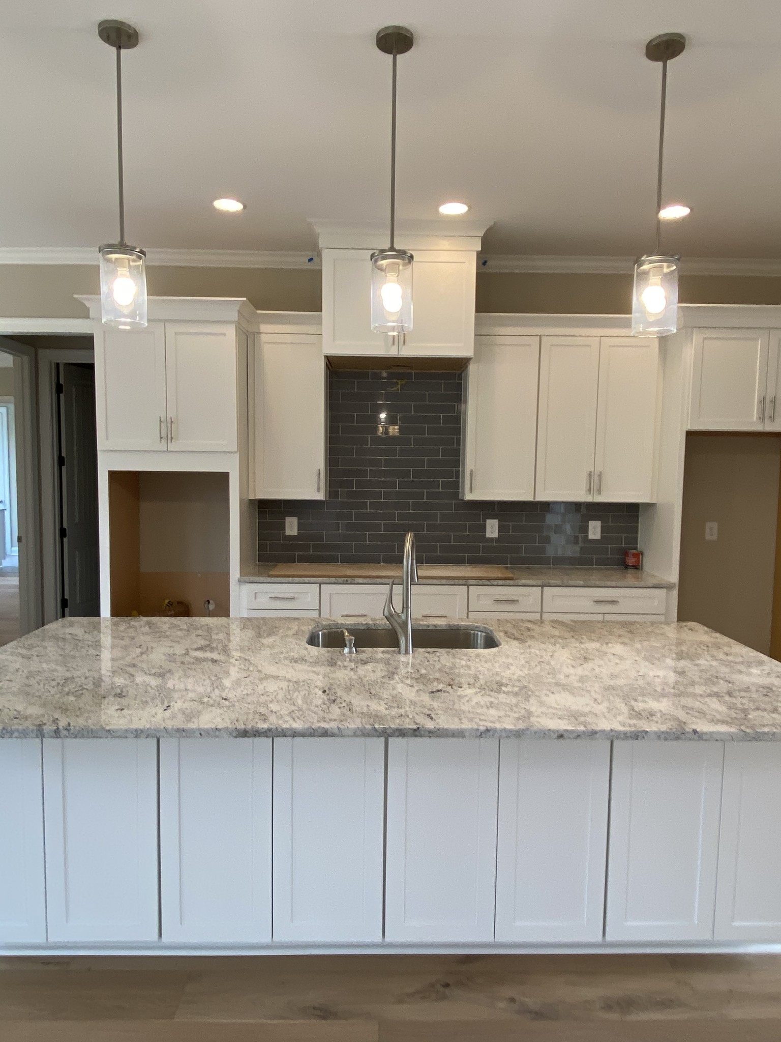 2019 Eagle View Road Hendersonville, TN 37075 - Photo 5 of 19 a kitchen with kitchen island granite countertop a sink a counter top space cabinets and stainless steel appliances