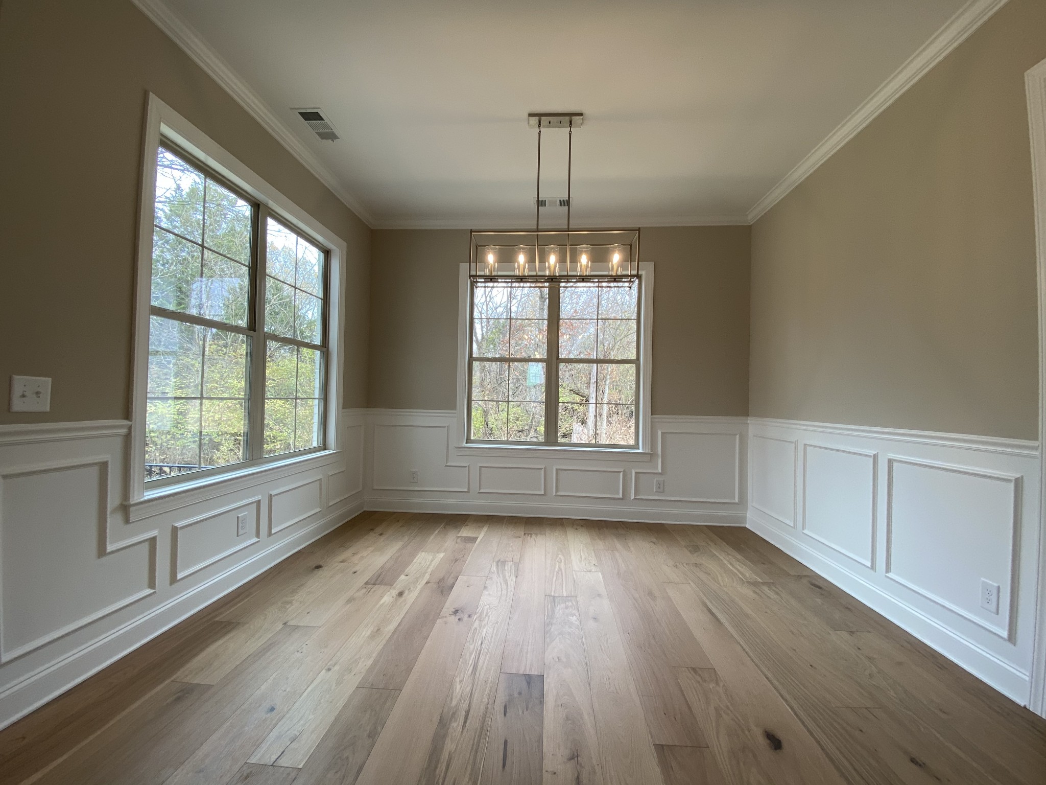 2019 Eagle View Road Hendersonville, TN 37075 - Photo 6 of 19 a view of an empty room with wooden floor and a window