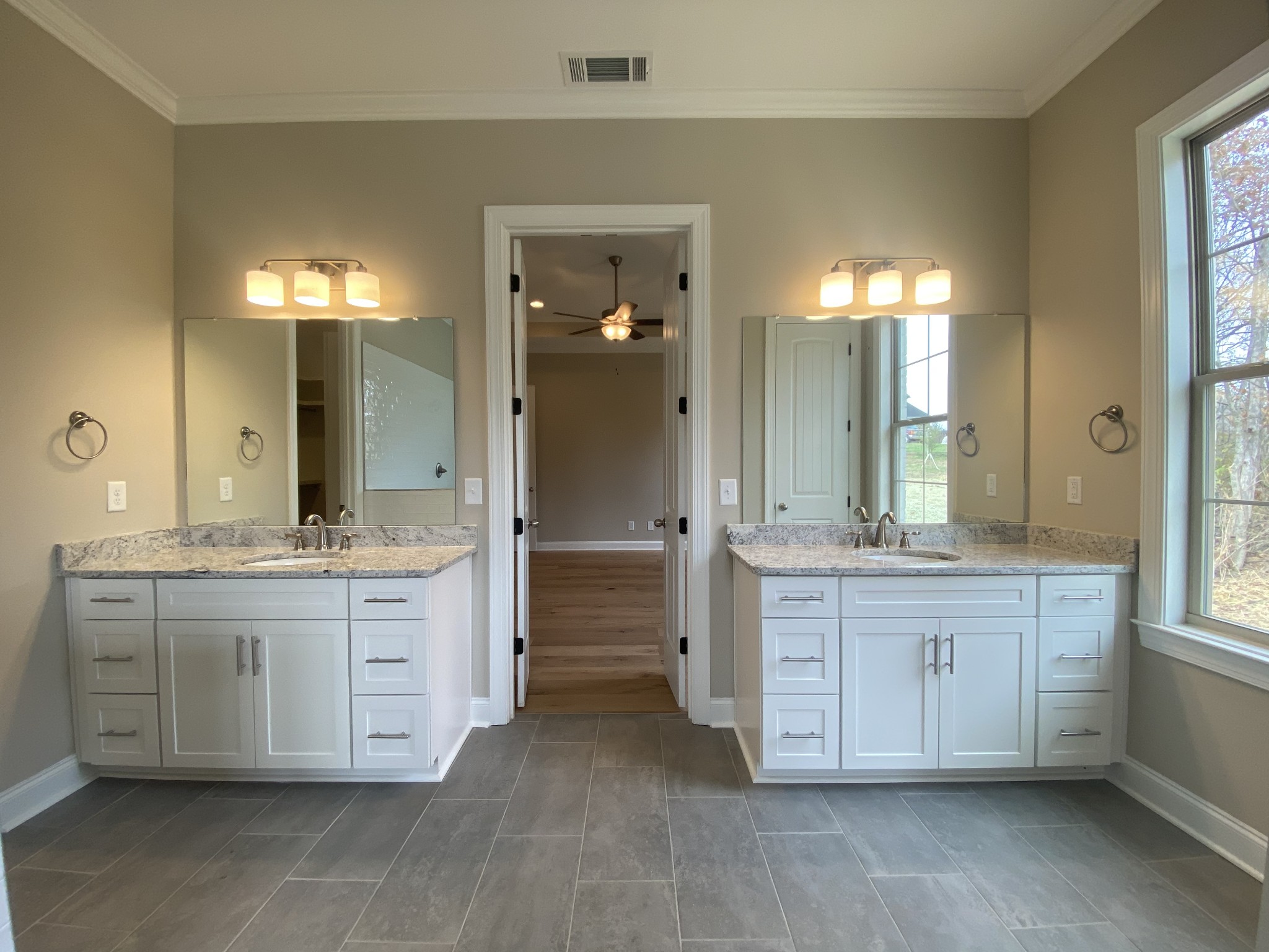2019 Eagle View Road Hendersonville, TN 37075 - Photo 10 of 19 a bathroom with a granite countertop double vanity sink mirror bathtub and double