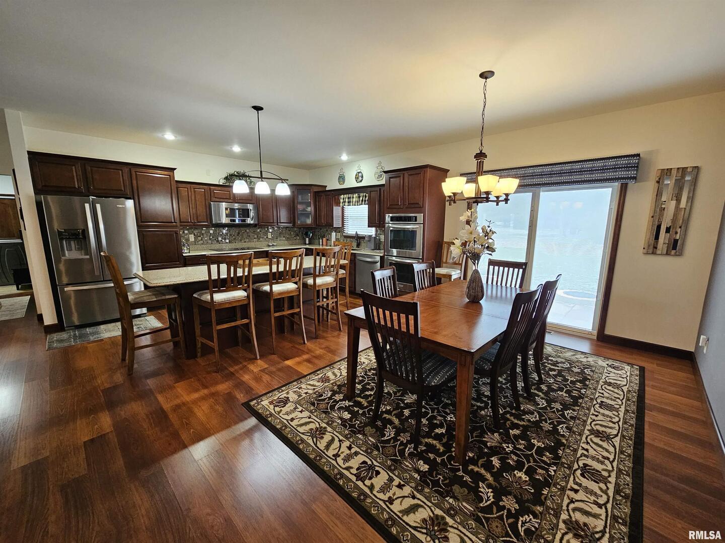 10586 North Spring Garden Lane Mount Vernon, IL 62864 - Photo 20 of 39 a view of a dining room with furniture