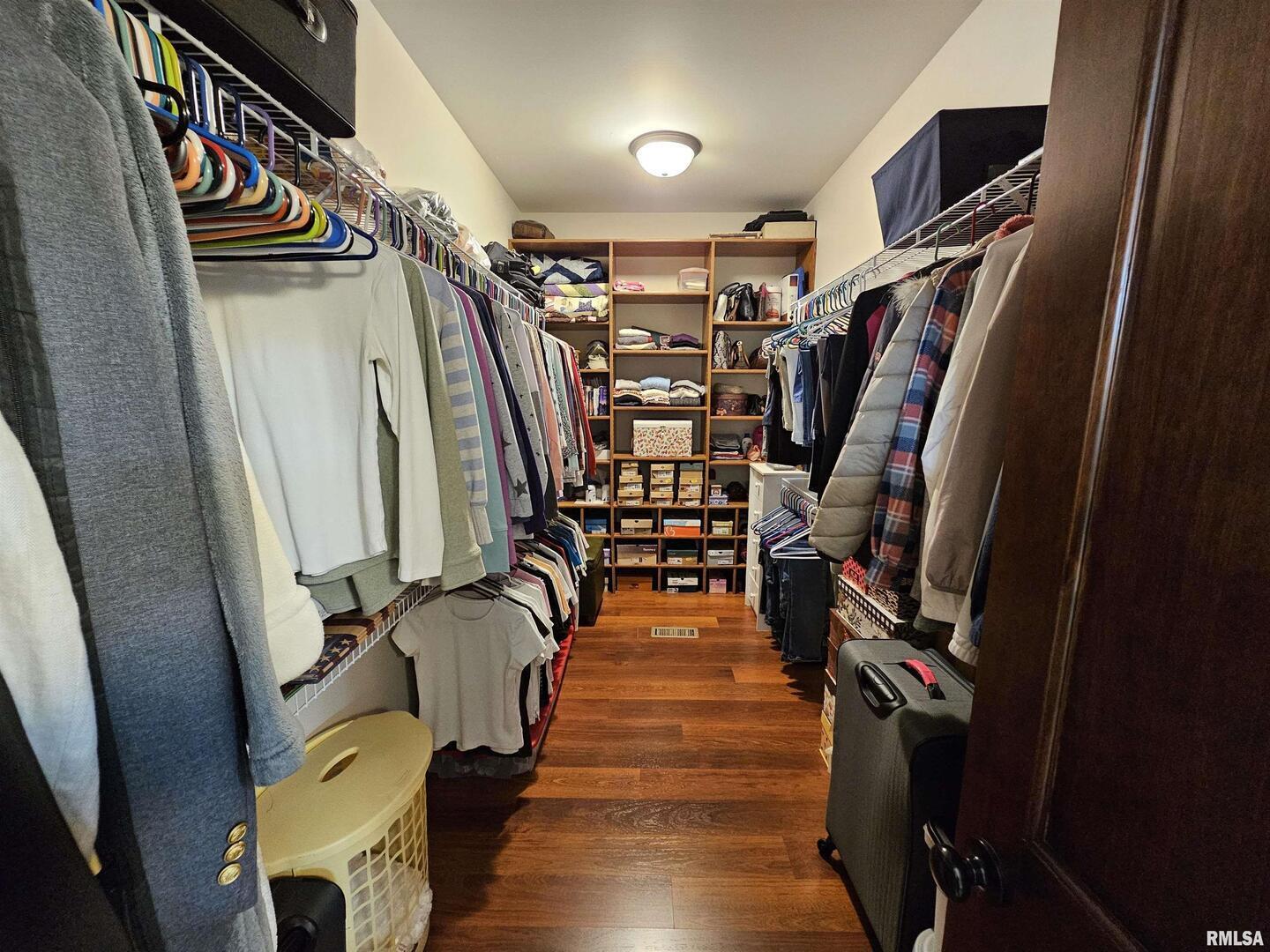 10586 North Spring Garden Lane Mount Vernon, IL 62864 - Photo 34 of 39 a view of walk in closet with clothes and shoes