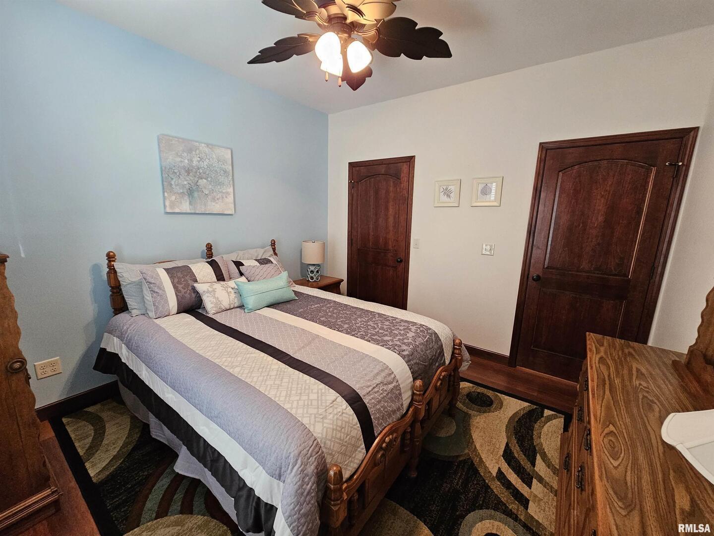 10586 North Spring Garden Lane Mount Vernon, IL 62864 - Photo 35 of 39 a bedroom with a bed and a mirror