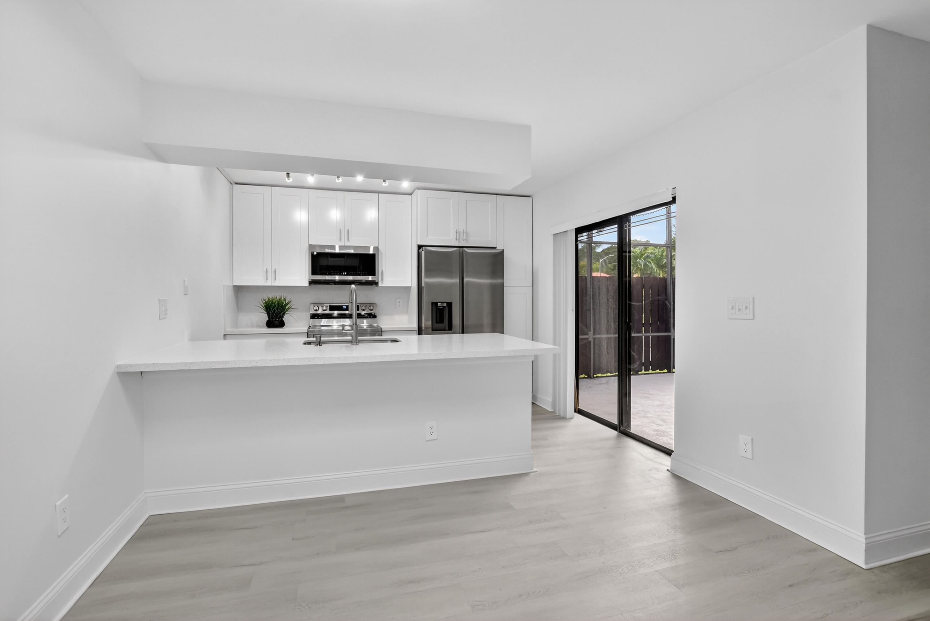 8319 Boca Rio Drive Boca Raton, FL 33433 - Photo 10 of 52 Dining Room and Kitchen
