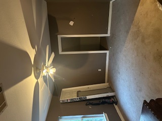1017 West 3rd Street Taylor, TX 76574 - Photo 16 of 23 an empty room with closet and mirrors