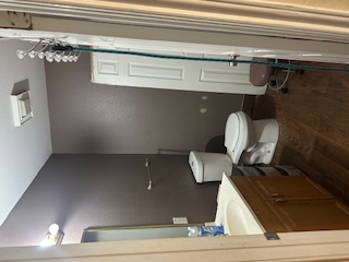1017 West 3rd Street Taylor, TX 76574 - Photo 10 of 23 a bathroom with a sink a toilet and shower