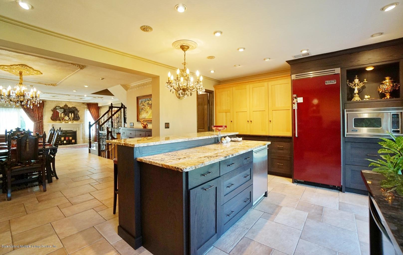 178 Admiralty Loop Staten Island, NY 10309 - Photo 15 of 50 a spacious bathroom with a granite countertop sink and a large mirror