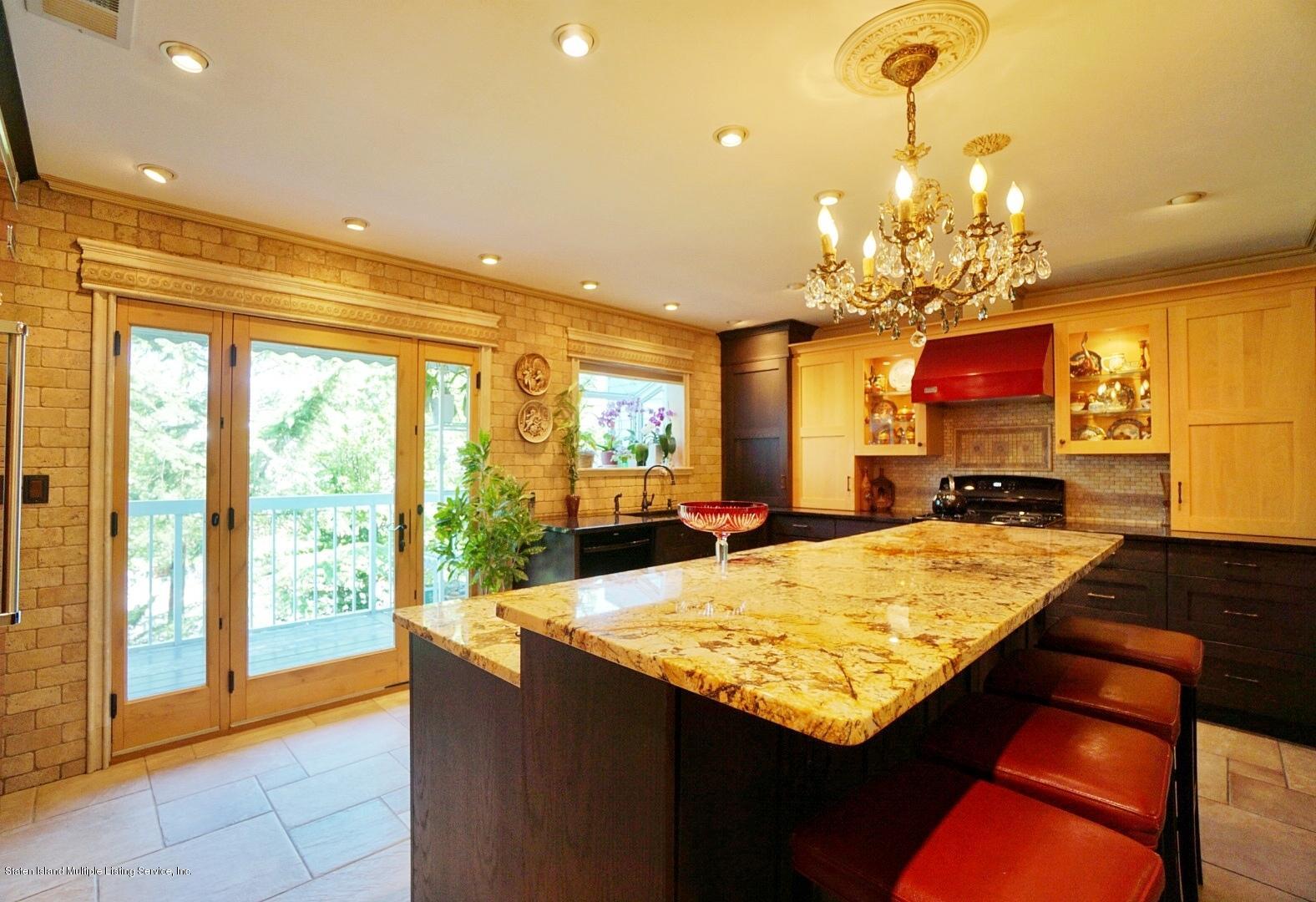 178 Admiralty Loop Staten Island, NY 10309 - Photo 16 of 50 a room with pool table and glass windows