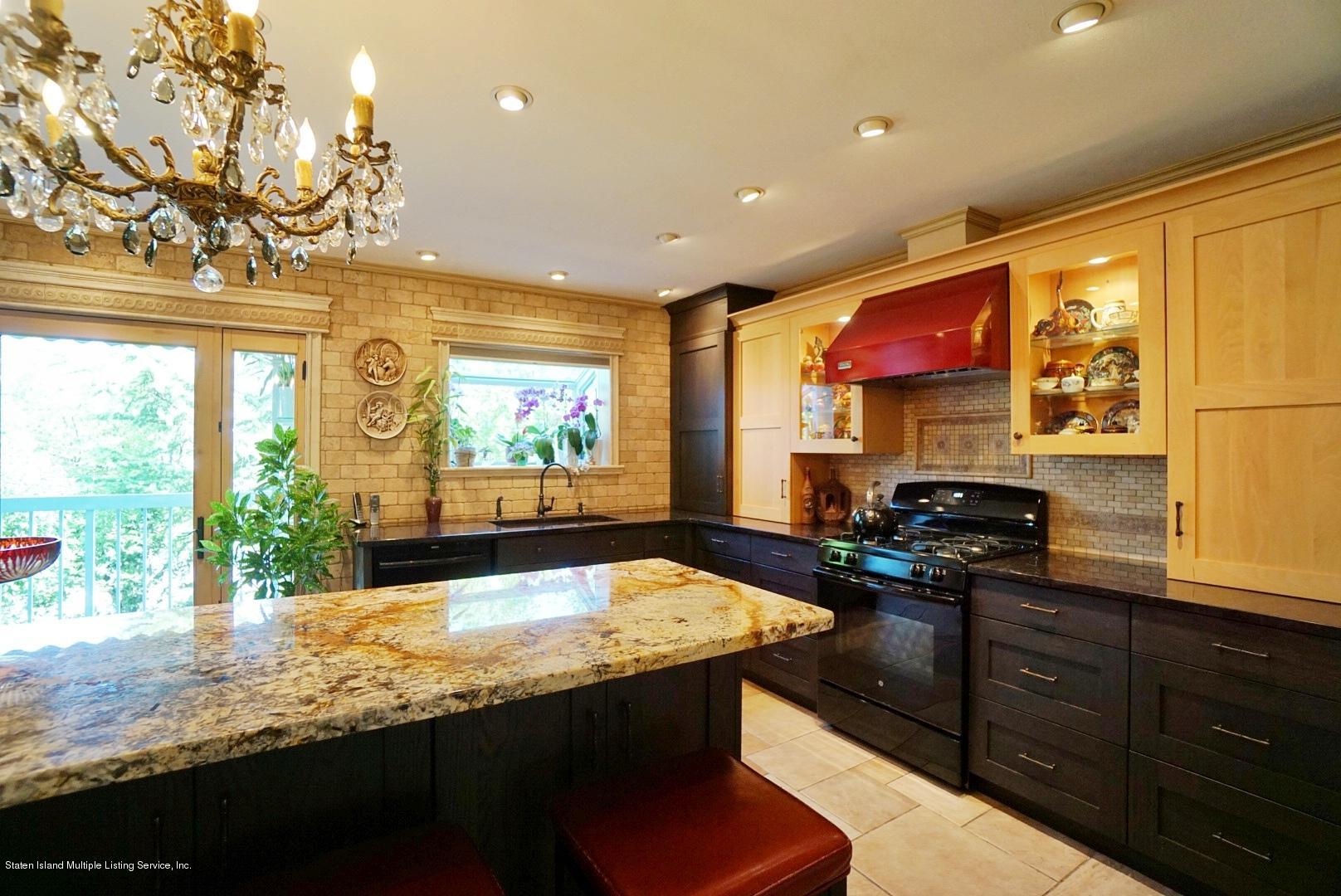 178 Admiralty Loop Staten Island, NY 10309 - Photo 18 of 50 a kitchen with stainless steel appliances granite countertop a sink stove and cabinets