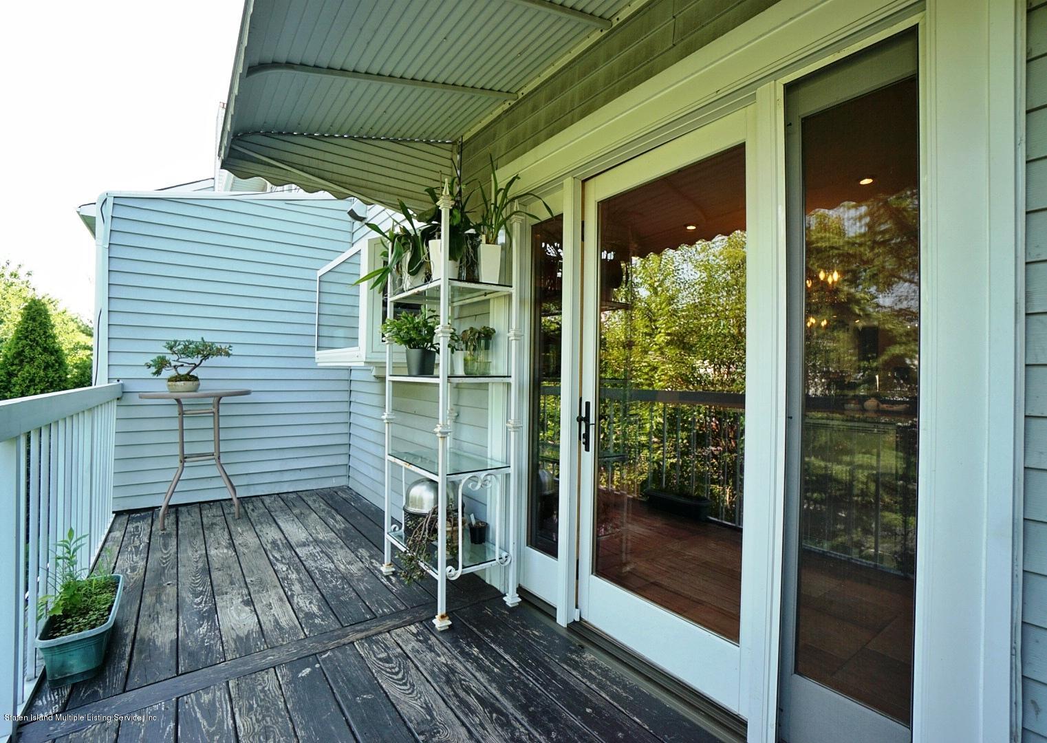 178 Admiralty Loop Staten Island, NY 10309 - Photo 20 of 50 a view of a balcony with wooden floor
