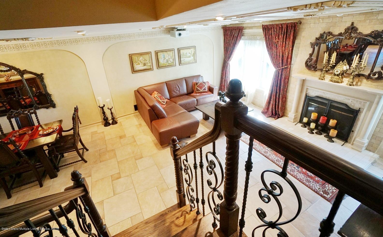 178 Admiralty Loop Staten Island, NY 10309 - Photo 24 of 50 a living room with furniture and a flat screen tv