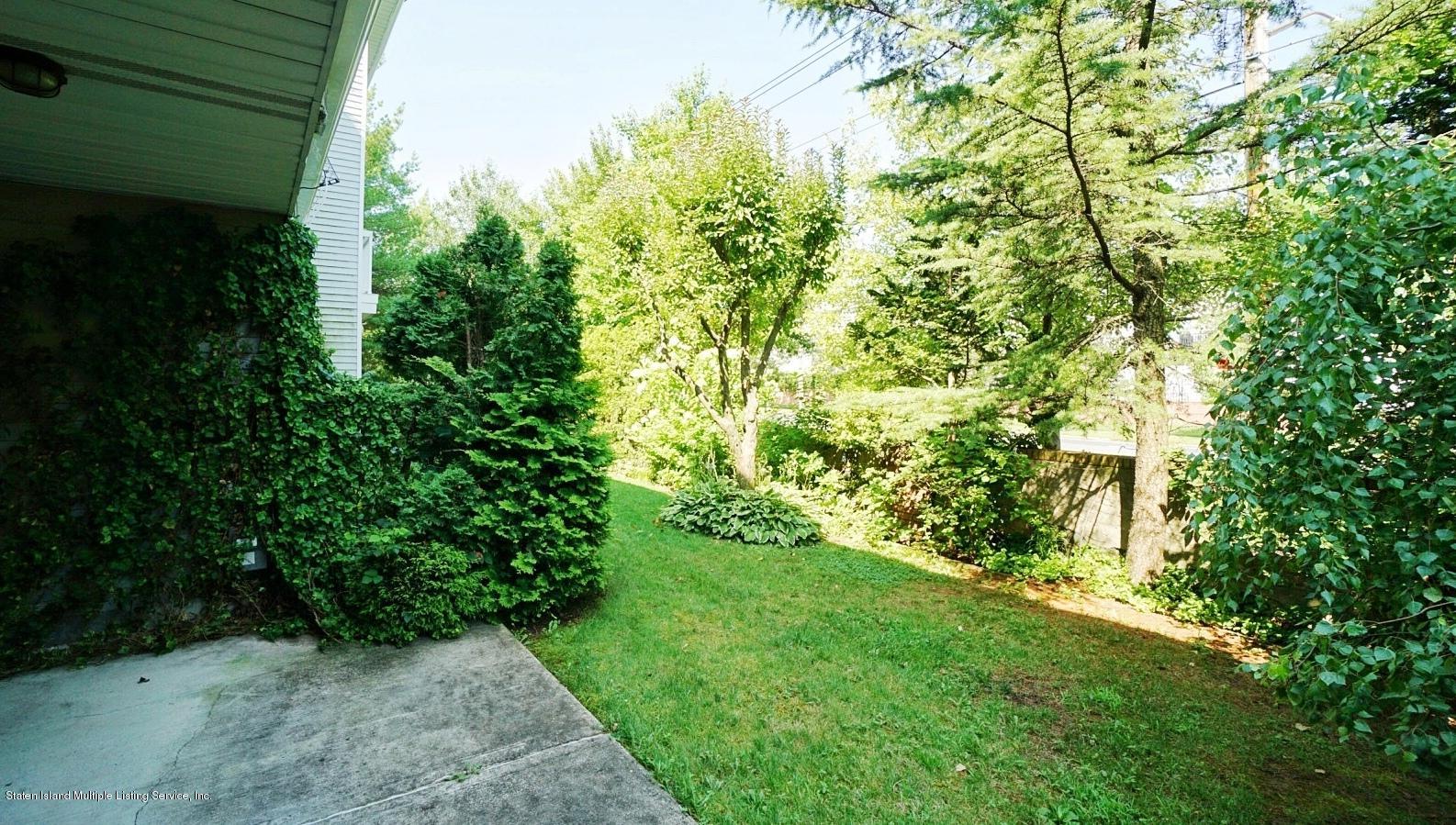 178 Admiralty Loop Staten Island, NY 10309 - Photo 39 of 50 a view of yard with green space