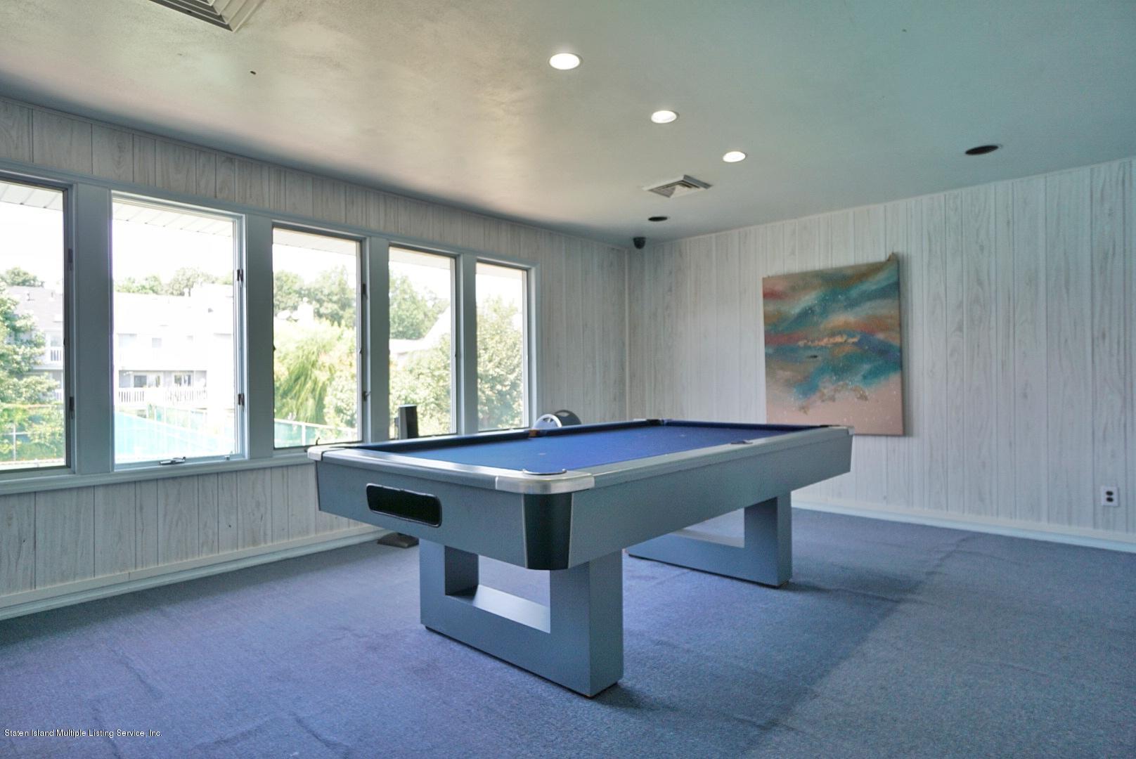 178 Admiralty Loop Staten Island, NY 10309 - Photo 46 of 50 a room with pool table and windows