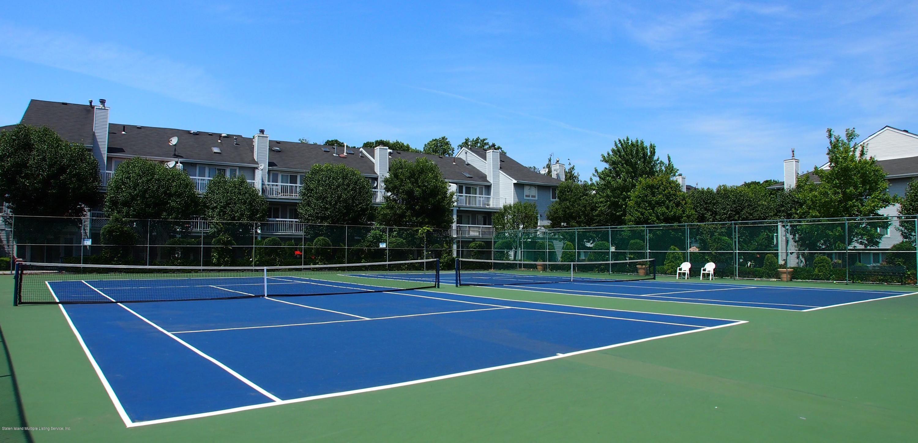 178 Admiralty Loop Staten Island, NY 10309 - Photo 48 of 50 a view of tennis court with houses