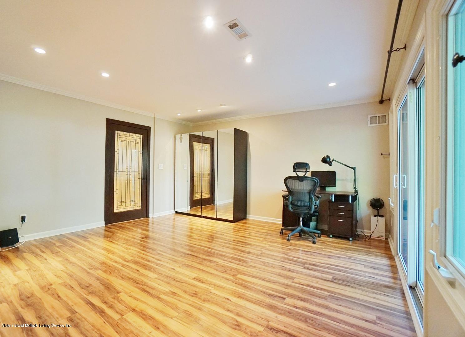 178 Admiralty Loop Staten Island, NY 10309 - Photo 7 of 50 a view of livingroom with furniture and wooden floor