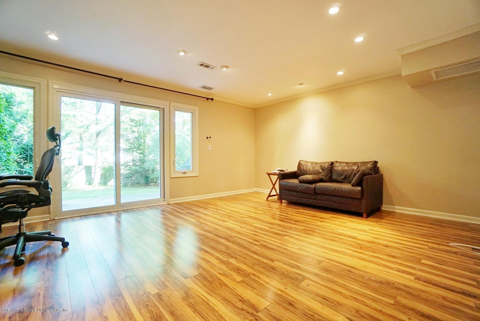 178 Admiralty Loop Staten Island, NY 10309 - Photo 9 of 50 a living room with furniture and a large window
